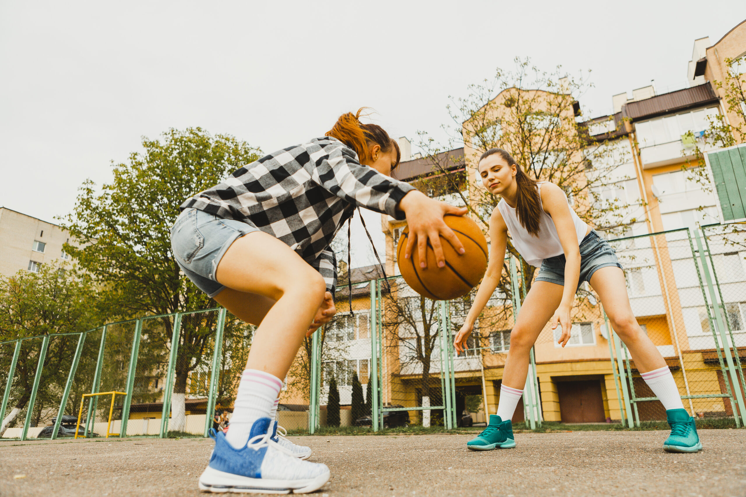 girls-playing-basketball